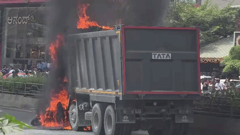 Lorry catches fire after collision with biker