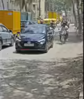 Haralur Road turns commuter nightmare as potholes, dug-up stretches persist