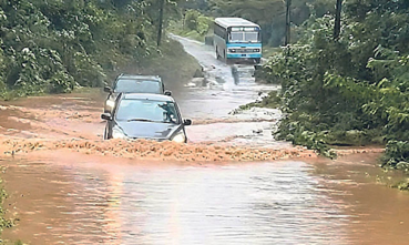 Heavy downpour disrupts life; floodwaters enter Adi Subrahmanya temple, bridge submerged