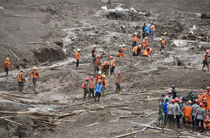 17 dead, dozens missing after landslide buries village in Indonesia