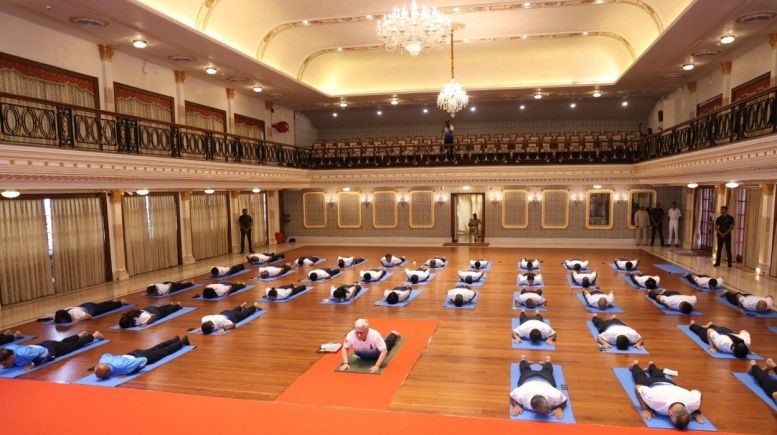 Maha Guv joins Coast Guard in performing yoga