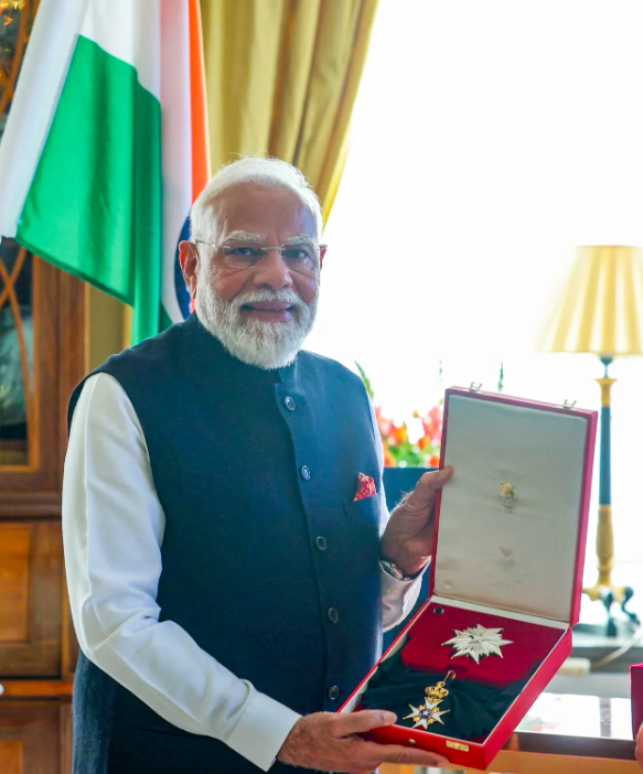 NDA hails Modi for receiving