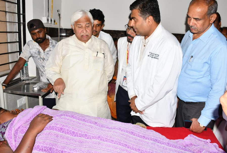 H. K. Patil reviews patient condition at hospital