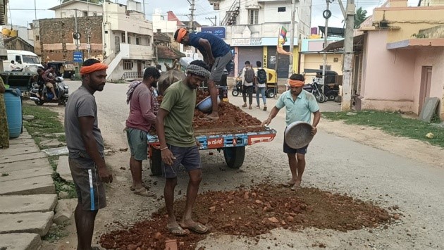 Bullock Cart Drivers Take Road Repairs into Their Own Hands