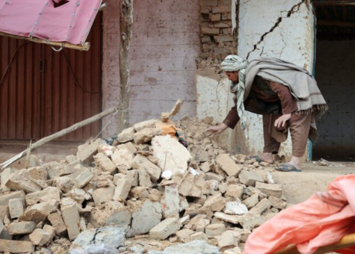 Afghans dig through dust and debris after deadly quake
