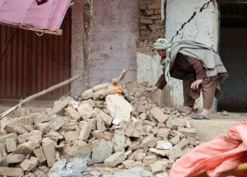 Afghans dig through dust and debris after deadly quake